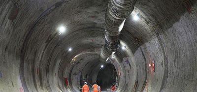 MDJV colleagues walk through the traction substation tunnel at Euston, discussing the works and the tunnel's purpose to redirect services and provide ventilation to the new traction substation, known as the Sugar Cube.