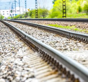 Railroad track rails in country landscape