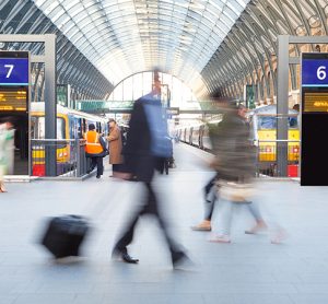 London Train Tube station Blur people movement in rush hour, at King's Cross station,